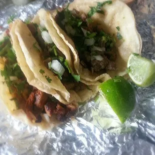 Tacos steak (asada), pork (pastor), beef tongue (lengua).  Yum