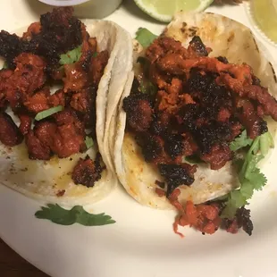 two tacos on a plate