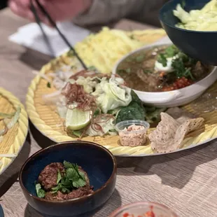 Don't forget the crushed peppers. Mì quảng gà here.