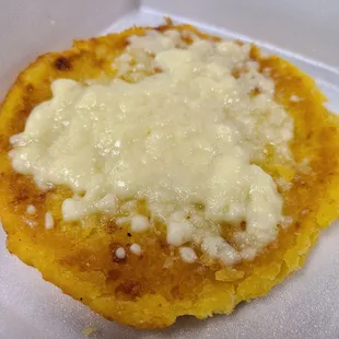 Arepa de Choclo Con Queso - $4.99 ( sweet corn cake with cheese)