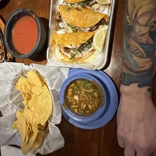 Quesabarria. Ask for onions cilantro only, no lettuce. Lettuce is too strong flavor for barria style tacos