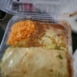 Wet asada burrito w/green sauce, rice and bean