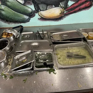 Salad bar and menudo topping area