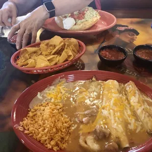 Build your own combination. Chile Relleno, tamale and a chicken chimichanga beans and rice and green Chile. Free chips and salsa.