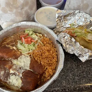 Cuatro #4 chicken tamale, cheese enchilada, Beef Taco. Side Espinaca Cheese Dip