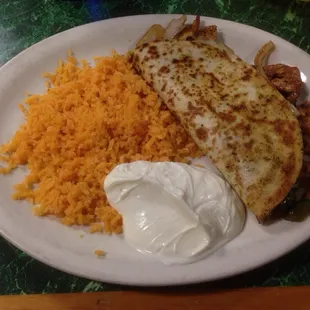 Quesadilla Veracruz with chicken, rice and sour cream. The meat was flavored very well.