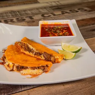 Queso birria tacos
