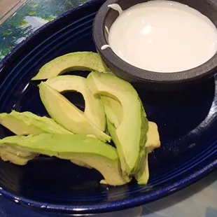 Side of avocado and sour cream