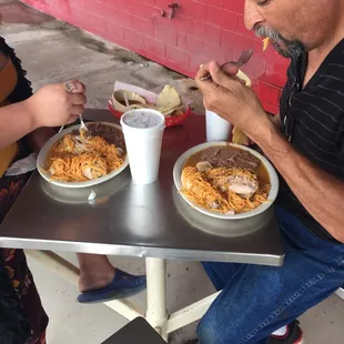 a man and a woman eating