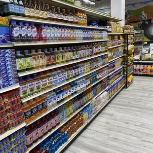 a grocery store aisle filled with drinks