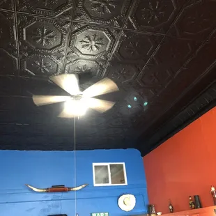 a ceiling with a ceiling fan