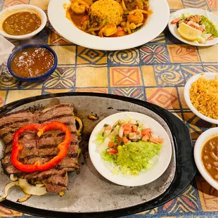 a variety of mexican food on a table