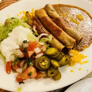 a plate of mexican food on a table