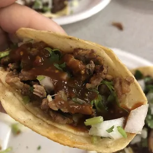 Asada(steak) taco with rojo salsa