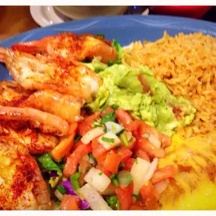 Tampiquena Mar. marinated jumbo shrimp, cheese enchilada. served with rice, charro beans, guacamole, tortillas, pico de gallo.