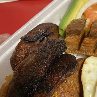 Burned plantains, thin dry burned meat