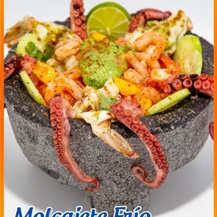 a bowl of seafood and vegetables