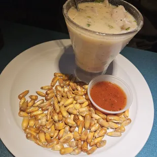 Leche de tigre with canchas on the side