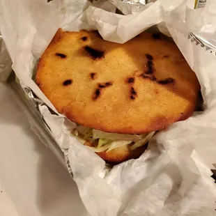 a sandwich in a wrapper