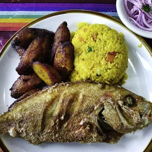 Red Snapper-whole fried; sides: plantains &amp; yellow rice; pickled raw onion is additional side