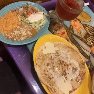 #34 Sunbury choice (chicken quesadilla covered in queso, rice, beans, lettuce, pico, sour cream) and cactus berry margarita