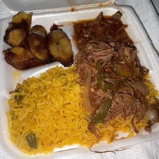 Ropa vieja with yellow rice and plantains
