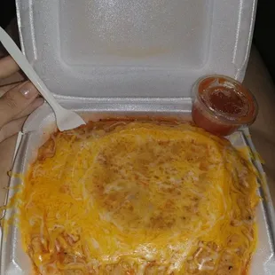 Al Pastor Wet burrito. So delicios and big enough for several meals! This huge burrito is less than 10 bucks!