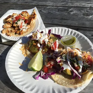 Fried avocado tacos and a chicken taco. Expect to get a little messy- but it&apos;s so delicious you probably won&apos;t notice.