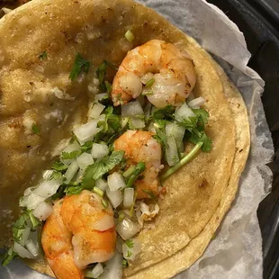 First time there. $3.50 for a shrimp taco that has three tiny shrimp and mostly onions. And then the bag of chips and salsa for $4.99...