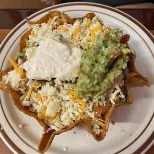 Taco Salad, half went home.