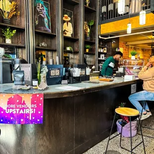 a man sitting at the counter