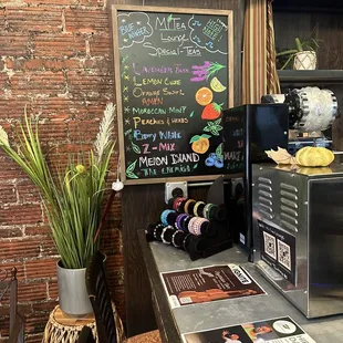 a coffee machine and menu