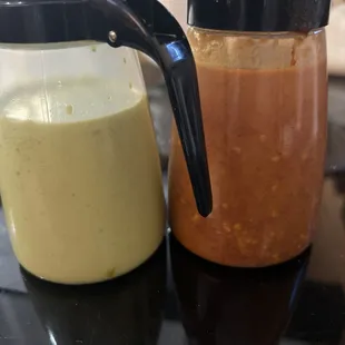 Hot sauce in pancake syrup containers.