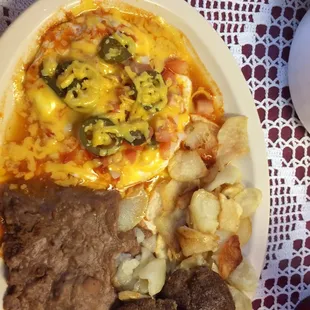 The huevos compusetos plate with sausage added