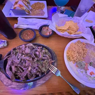 Unseasoned Steak fajitas and extra dry shredded chicken tacos