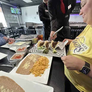 a woman serving food