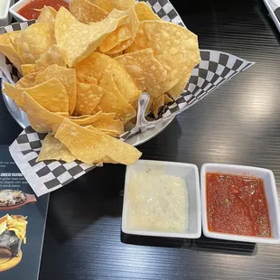 Complimentary chips, salsa, and special sauce
