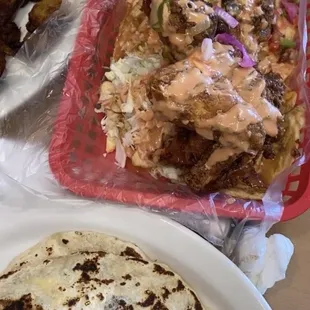 a plate of food and a loaf of bread