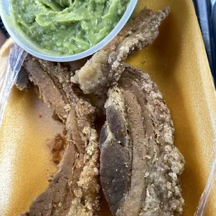 I didn't realize it was National guacamole day till I was eating this pork and guacamole in the car outside of the meat market.  Yummm