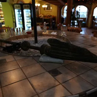 an umbrella on a table in a restaurant