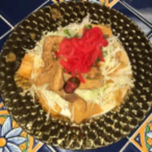 Yuca con chicharron/Yucca Root with pork cracklins