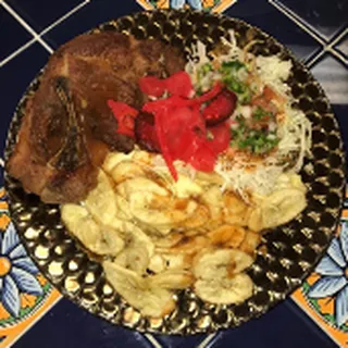 Chuleta Frita Con Tajadas