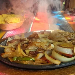 The chicken fajitas were hot and amazing! I absolutely loved the Marigarita, it was wonderful!!