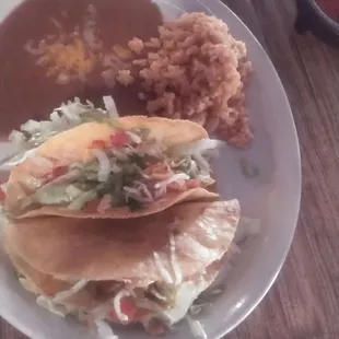 Lunch special. Beef or chicken. I ordered the chicken on grilled taco shell. Very good.