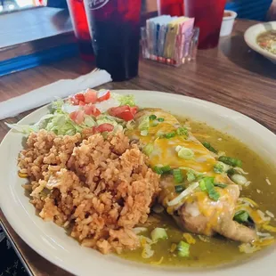 Chile Renno with a side of lettuce and tomato as well as rice and beans