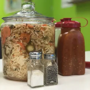 a jar of rice and vegetables