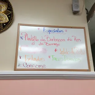 a white board with spanish writing on it