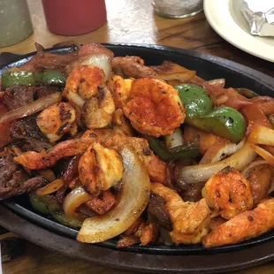 chicken, steak, and shrimp fajita.