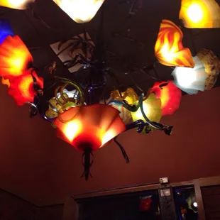 Don&apos;t miss the beautiful blown glass chandelier at the entryway.