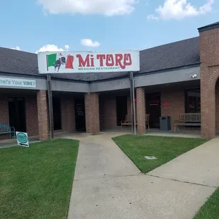 the front entrance of a restaurant